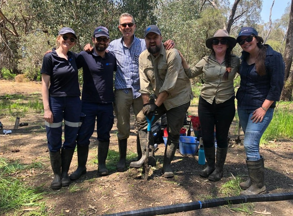 Perth team Volunteer Day planting trees